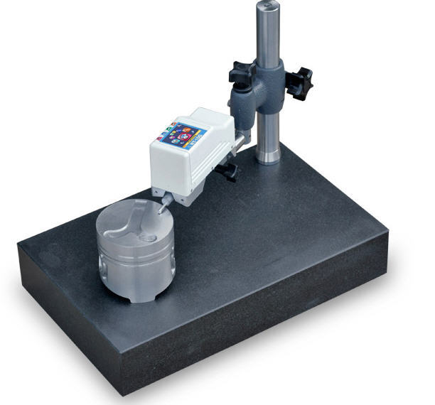 Code: 1402 - ST1 stand composed by 400x250 mm granite plane with column. Maximum height from the surface: h=150 mm. Code: 1402 - ST1 stand composed by 400x250 mm granite plane with column. Maximum height from the surface: h=150 mm.